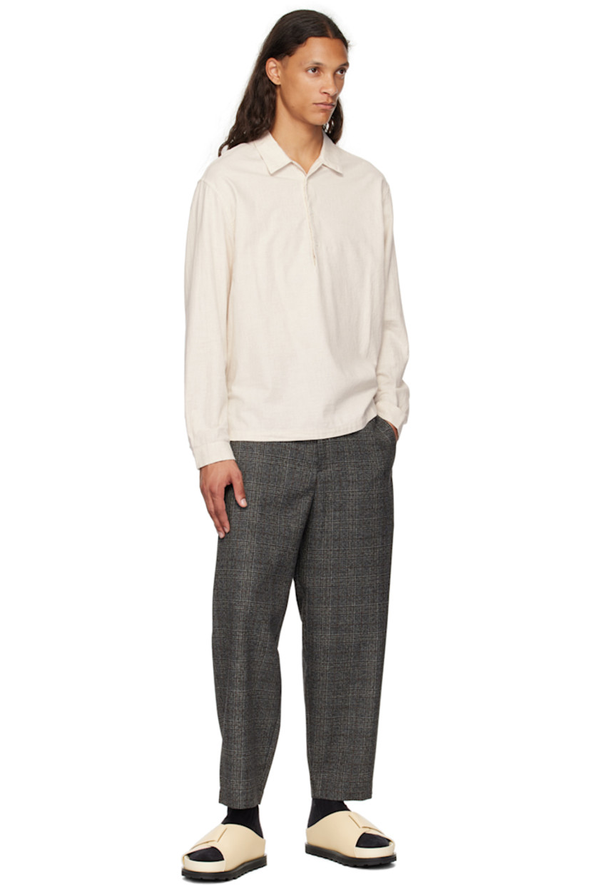 Lightweight cotton flannel shirt. 

· Open spread collar
· Three-button placket
· Tennis-tail hem
· Single-button barrel cuffs
· Mother-of-pearl hardware

Supplier color: Naturale