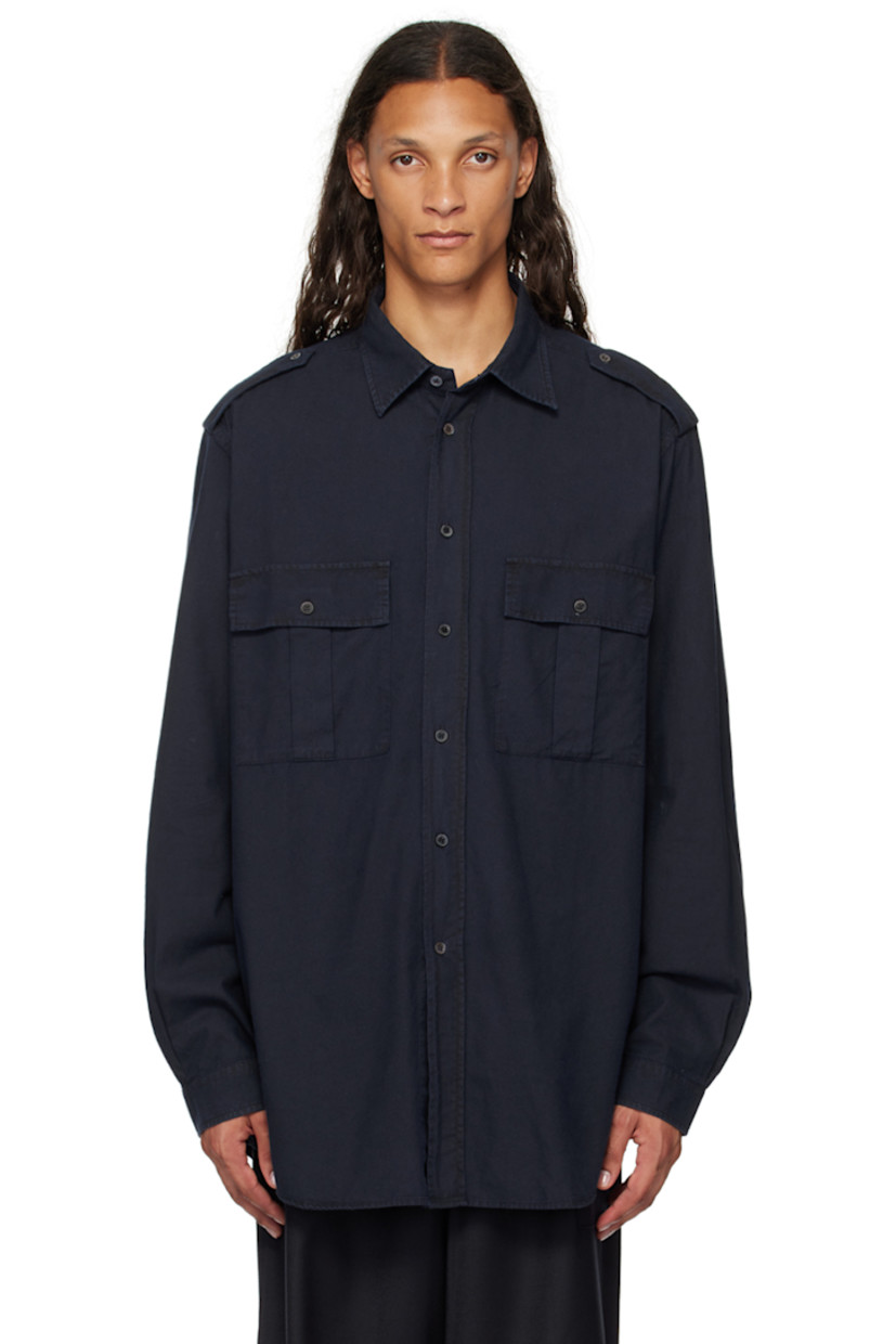 Oversized lightweight cotton flannel shirt.

· Open spread collar
· Button closure
· Flap pockets at chest
· Shirttail hem
· Button epaulets
· Single-button barrel cuffs
· Mother-of-pearl hardware

Supplier color: Navy