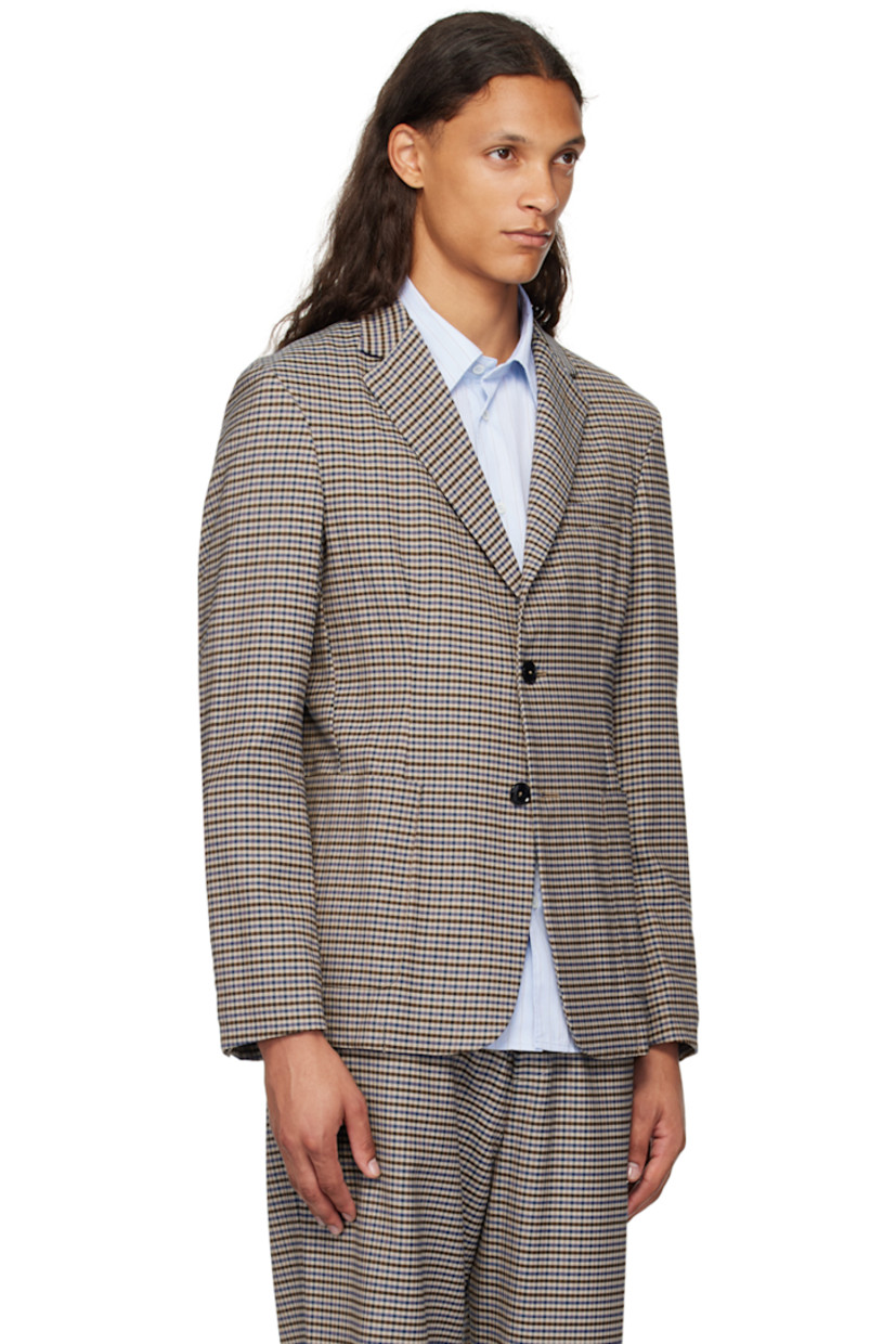 Stretch polyester -and virgin wool-blend Prince of Wales blazer.

· Notched lapel
· Button closure
· Patch pockets
· Four-button surgeon cuffs
· Twin vents at back hem
· Partial logo-woven twill lining

Supplier color: Unico