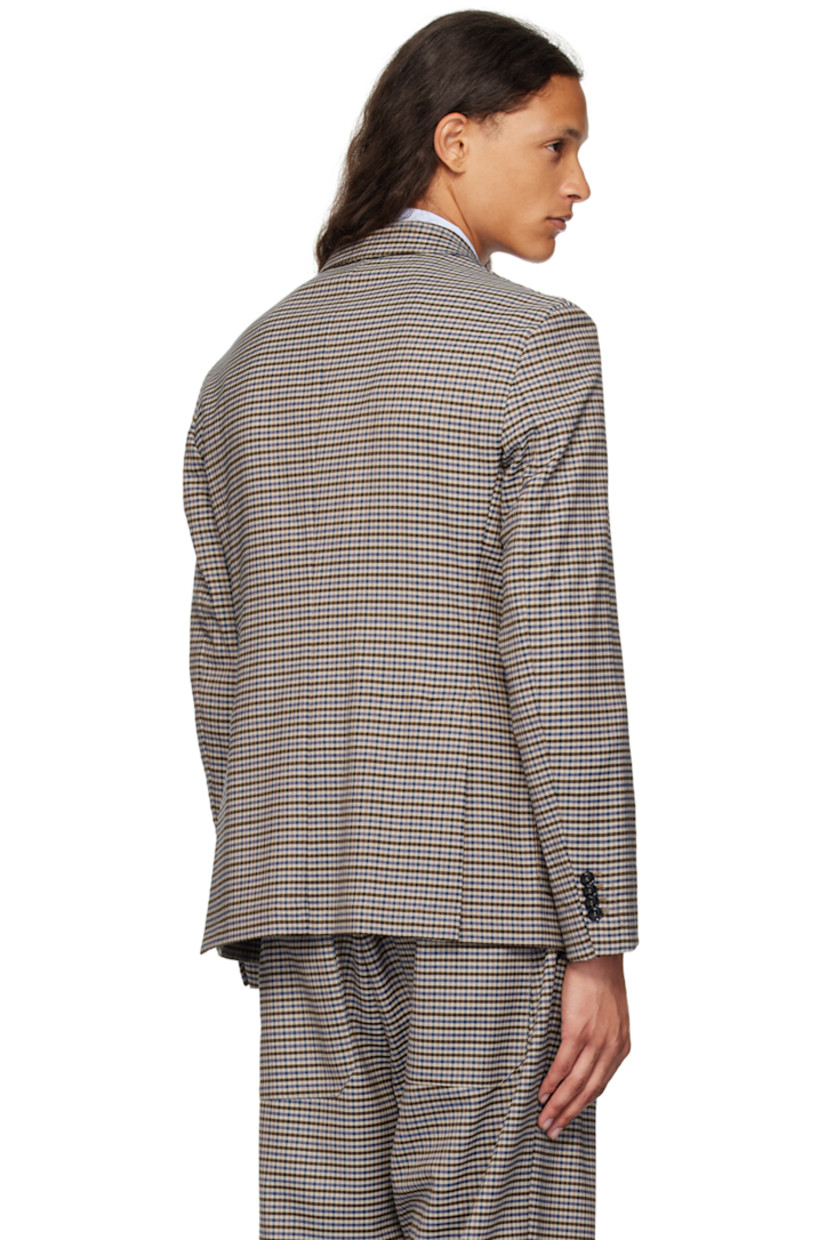 Stretch polyester -and virgin wool-blend Prince of Wales blazer.

· Notched lapel
· Button closure
· Patch pockets
· Four-button surgeon cuffs
· Twin vents at back hem
· Partial logo-woven twill lining

Supplier color: Unico