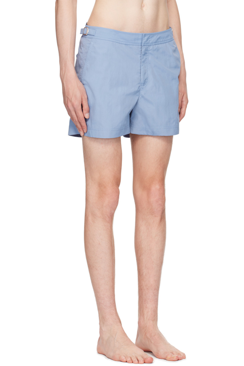Nylon canvas swim shorts. 

· Cinch tabs at waistband
· Three-pocket styling
· Zip-fly
· Logo flag at outseam
· Vented outseams
· Mesh briefs-style lining
· Logo-engraved silver-tone hardware

Supplier color: Springfield blue