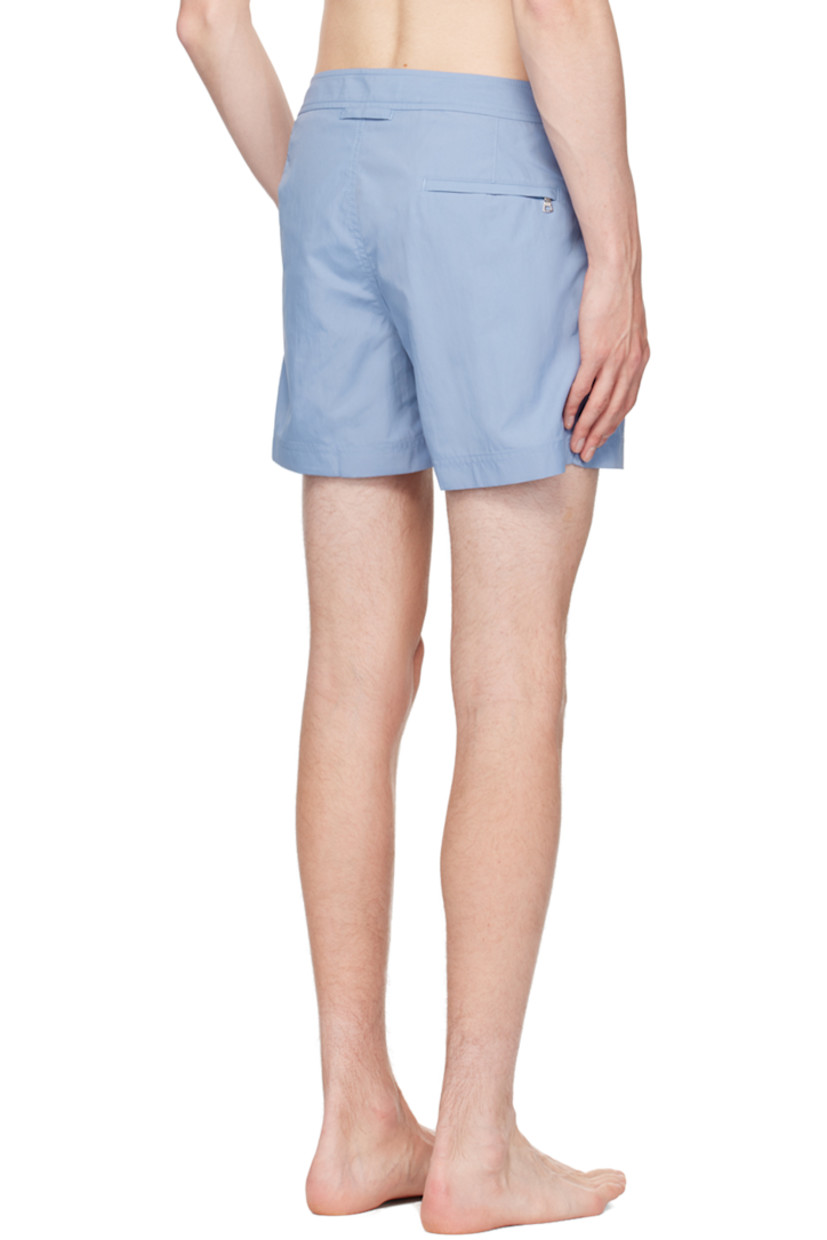 Nylon canvas swim shorts. 

· Cinch tabs at waistband
· Three-pocket styling
· Zip-fly
· Logo flag at outseam
· Vented outseams
· Mesh briefs-style lining
· Logo-engraved silver-tone hardware

Supplier color: Springfield blue