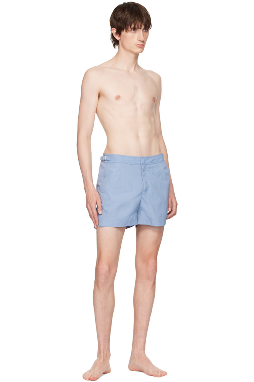 Nylon canvas swim shorts. 

· Cinch tabs at waistband
· Three-pocket styling
· Zip-fly
· Logo flag at outseam
· Vented outseams
· Mesh briefs-style lining
· Logo-engraved silver-tone hardware

Supplier color: Springfield blue