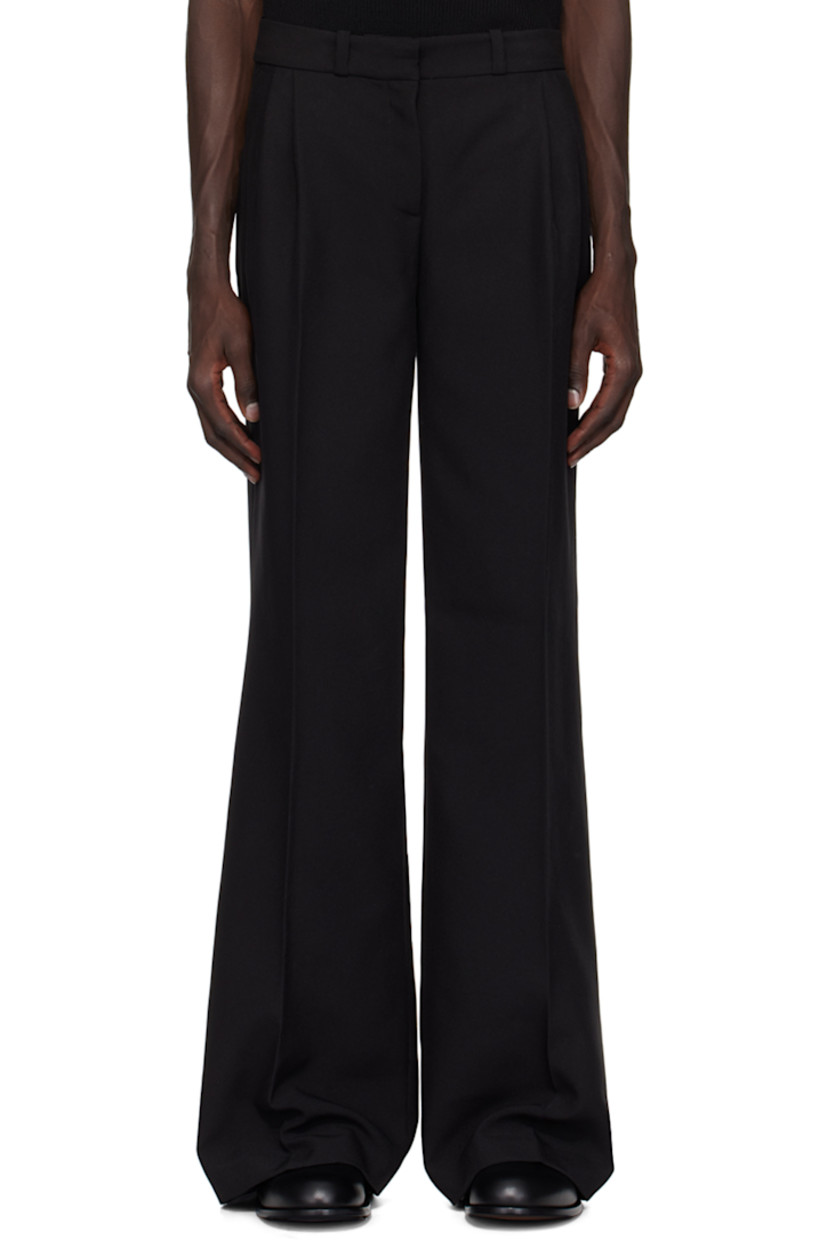 Polyester barathea trousers.

· Belt loops
· Three-pocket styling
· Zip-fly
· Pleats at front waistband
· Creased legs
· Darts at back waistband
· Logo hardware at back pocket
· Unlined

Supplier color: Black