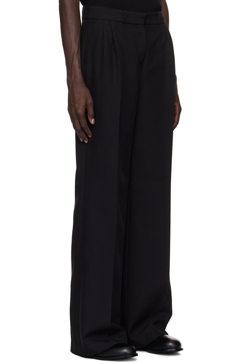 Polyester barathea trousers.

· Belt loops
· Three-pocket styling
· Zip-fly
· Pleats at front waistband
· Creased legs
· Darts at back waistband
· Logo hardware at back pocket
· Unlined

Supplier color: Black
