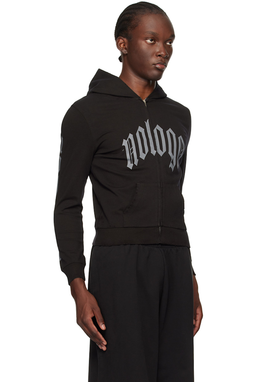 Lightweight stretch cotton jersey hoodie. Subtle distressing throughout. 

· Zip closure 
· Cracked text bonded at front and sleeves
· Patch pockets
· Rib knit hem and cuffs
· Dropped shoulders

Supplier color: Graphite
