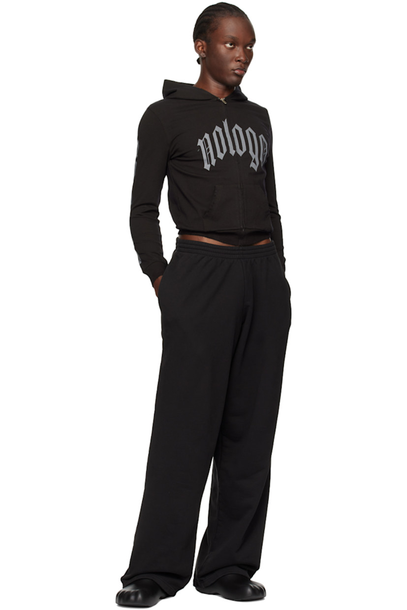 Lightweight stretch cotton jersey hoodie. Subtle distressing throughout. 

· Zip closure 
· Cracked text bonded at front and sleeves
· Patch pockets
· Rib knit hem and cuffs
· Dropped shoulders

Supplier color: Graphite