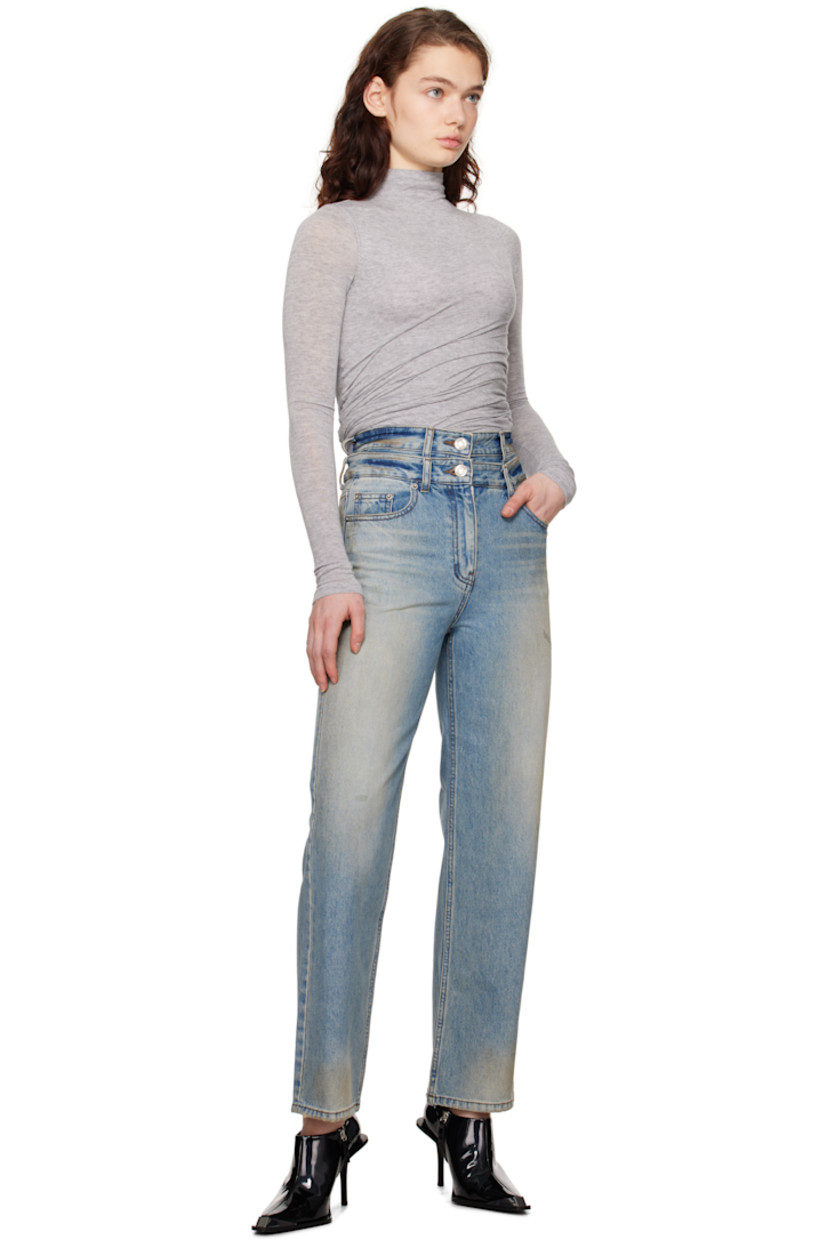 Stretch rayon- and wool-blend jersey turtleneck. 

· Draping at twisted side seams
· Logo flag at side seam
· Full mesh lining

Supplier color: Grey