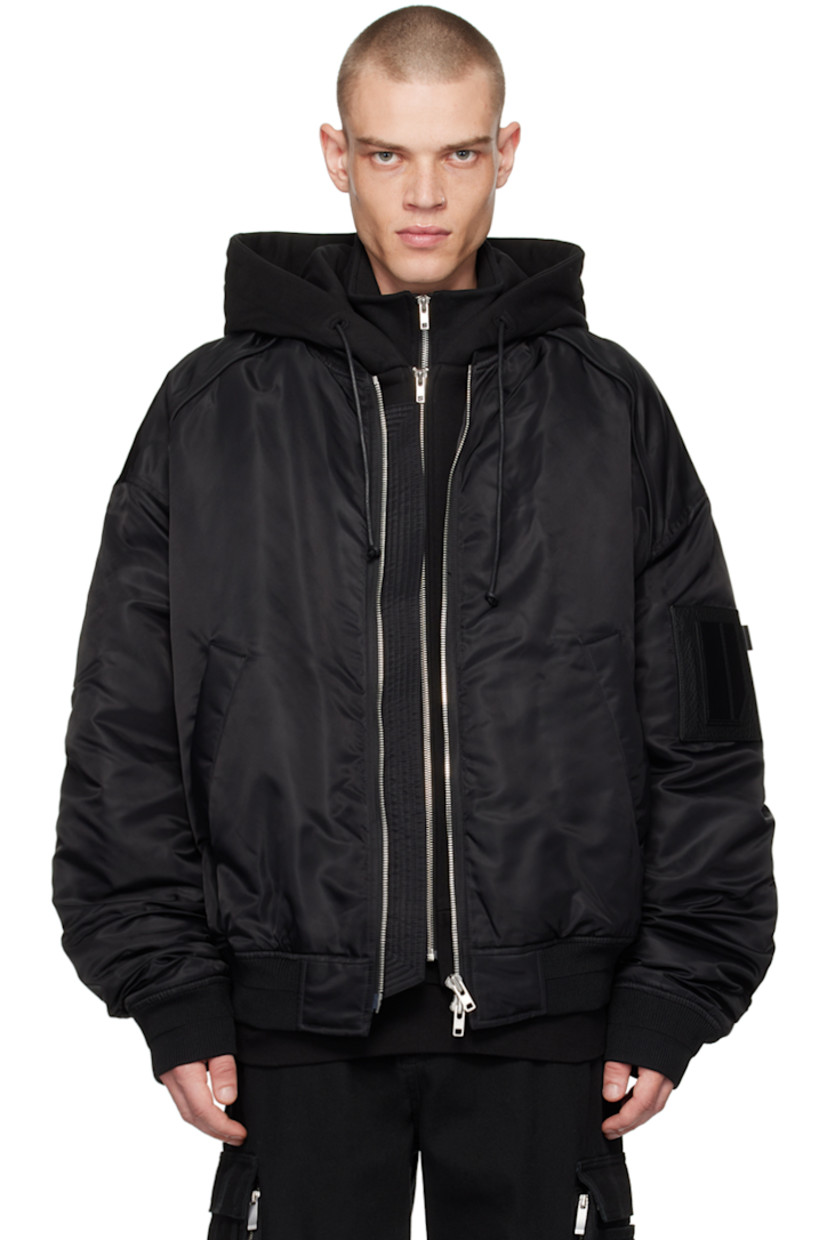 Heavyweight satin and jersey bomber jacket.

· Layered construction 
· Detachable hood at rib knit stand collar
· Welt pockets 
· Rib knit hem and cuffs
· Zip vent at side seams
· Dropped shoulders 
· Logo plaque at utility pocket 
· Full satin lining 

Supplier color: Black