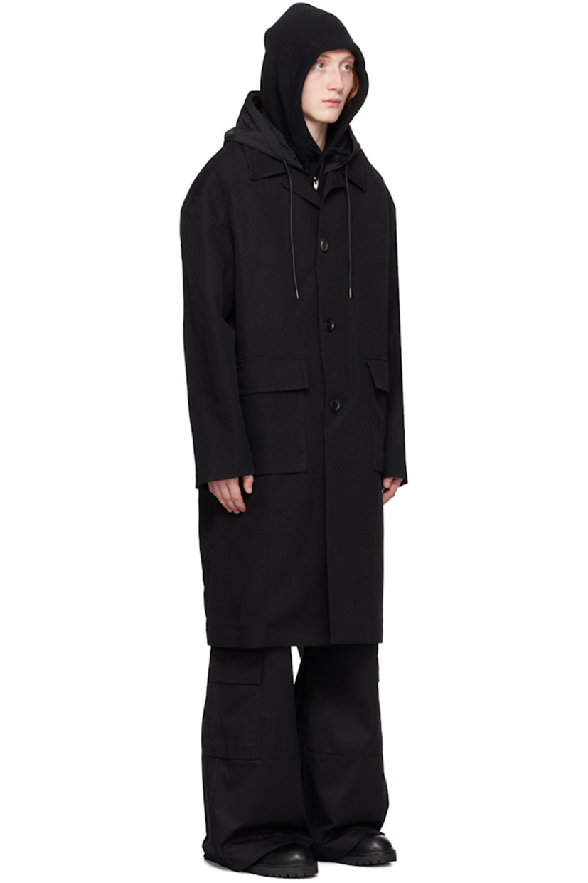 Wool-blend twill coat. Detachable hood-style cotton jersey and nylon taffeta overlay.

· Open spread collar
· Button closure
· Flap pockets 
· Raglan sleeves
· Welt pocket at interior
· Full satin lining

Supplier color: Black