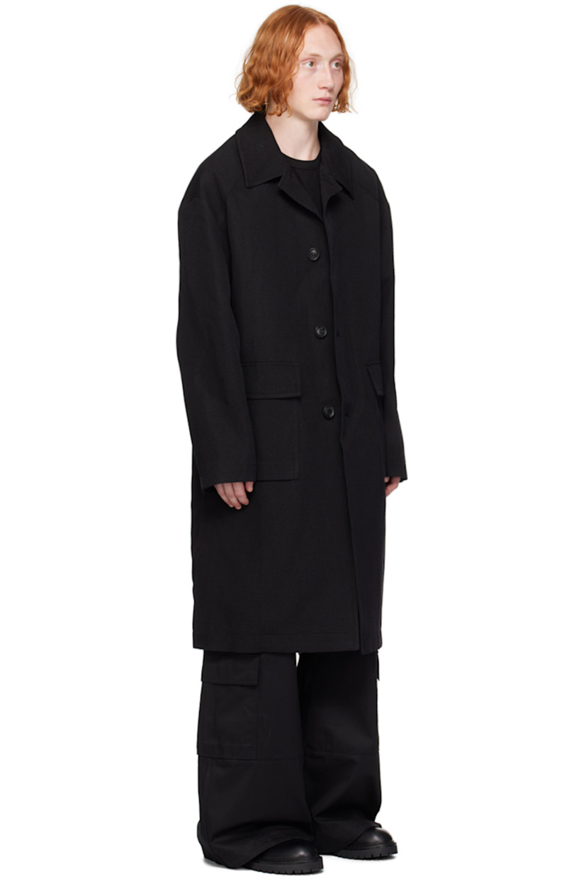 Wool-blend twill coat. Detachable hood-style cotton jersey and nylon taffeta overlay.

· Open spread collar
· Button closure
· Flap pockets 
· Raglan sleeves
· Welt pocket at interior
· Full satin lining

Supplier color: Black