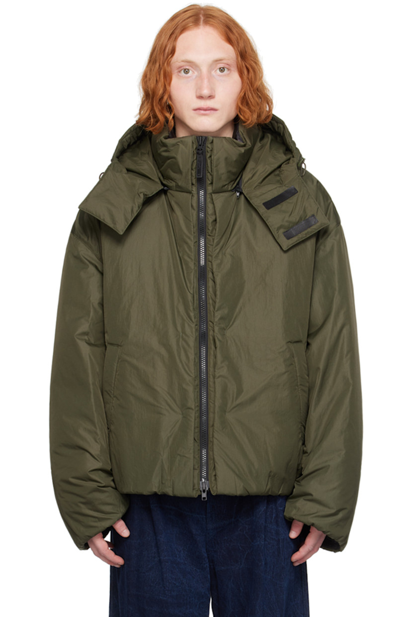 Insulated nylon ripstop jacket. 

· Bungee-style drawstring at detachable hood
· Funnel neck
· Two-way zip closure
· Welt pockets
· Concealed bungee-style drawstring at hem and cuffs
· Zip vent at side seams
· Welt pocket at interior
· Full polyester satin lining 

Supplier color: Khaki
