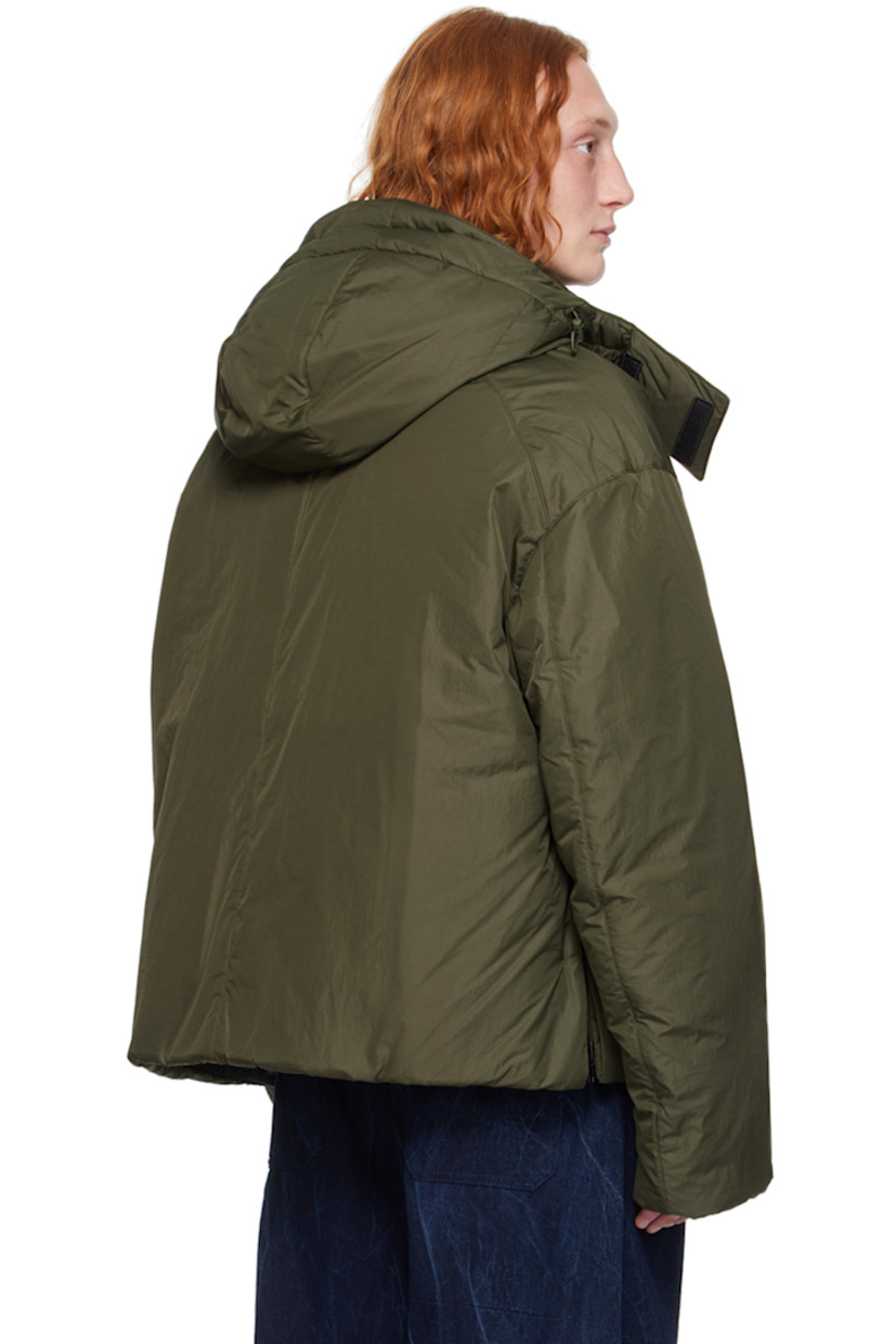 Insulated nylon ripstop jacket. 

· Bungee-style drawstring at detachable hood
· Funnel neck
· Two-way zip closure
· Welt pockets
· Concealed bungee-style drawstring at hem and cuffs
· Zip vent at side seams
· Welt pocket at interior
· Full polyester satin lining 

Supplier color: Khaki