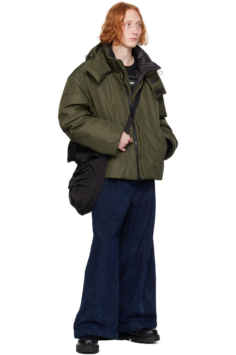 Insulated nylon ripstop jacket. 

· Bungee-style drawstring at detachable hood
· Funnel neck
· Two-way zip closure
· Welt pockets
· Concealed bungee-style drawstring at hem and cuffs
· Zip vent at side seams
· Welt pocket at interior
· Full polyester satin lining 

Supplier color: Khaki