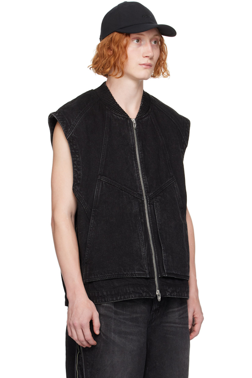 Oil-washed paneled non-stretch denim vest. 

· Elasticized stand collar
· Two-way zip closure
· Patch pockets
· Zip vent at side seams
· Unlined

Supplier color: Black