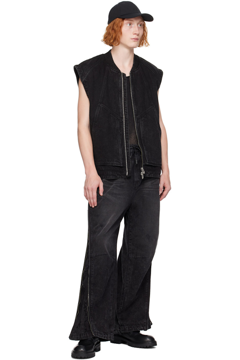 Oil-washed paneled non-stretch denim vest. 

· Elasticized stand collar
· Two-way zip closure
· Patch pockets
· Zip vent at side seams
· Unlined

Supplier color: Black
