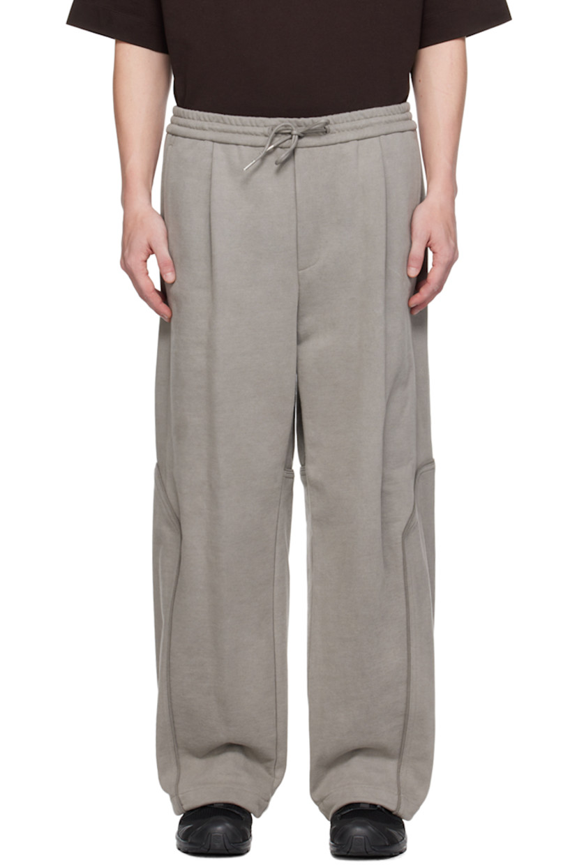 Paneled French terry sweatpants. 

· Drawstring at elasticized waistband
· Four-pocket styling
· Zip-fly
· Pleats at front

Supplier color: Beige