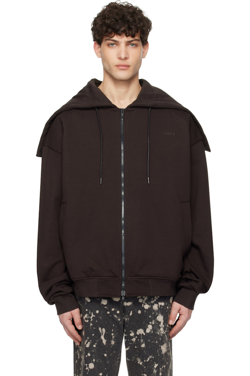 French terry hoodie.

· Zip vent and press-stud fastening at hood
· Drawstring at hood
· Two-way zip closure
· Logo embroidered at chest
· Welt pockets
· Rib-knit hem and cuffs

Supplier color: Dark brown