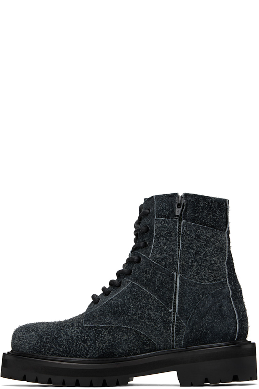 Ankle-high paneled nubuck boots in black.

· Lace-up closure
· Padded collar
· Pull-loop at heel collar
· Zip closure at inner side
· Treaded Vibram® rubber sole 

Supplier color: Ash