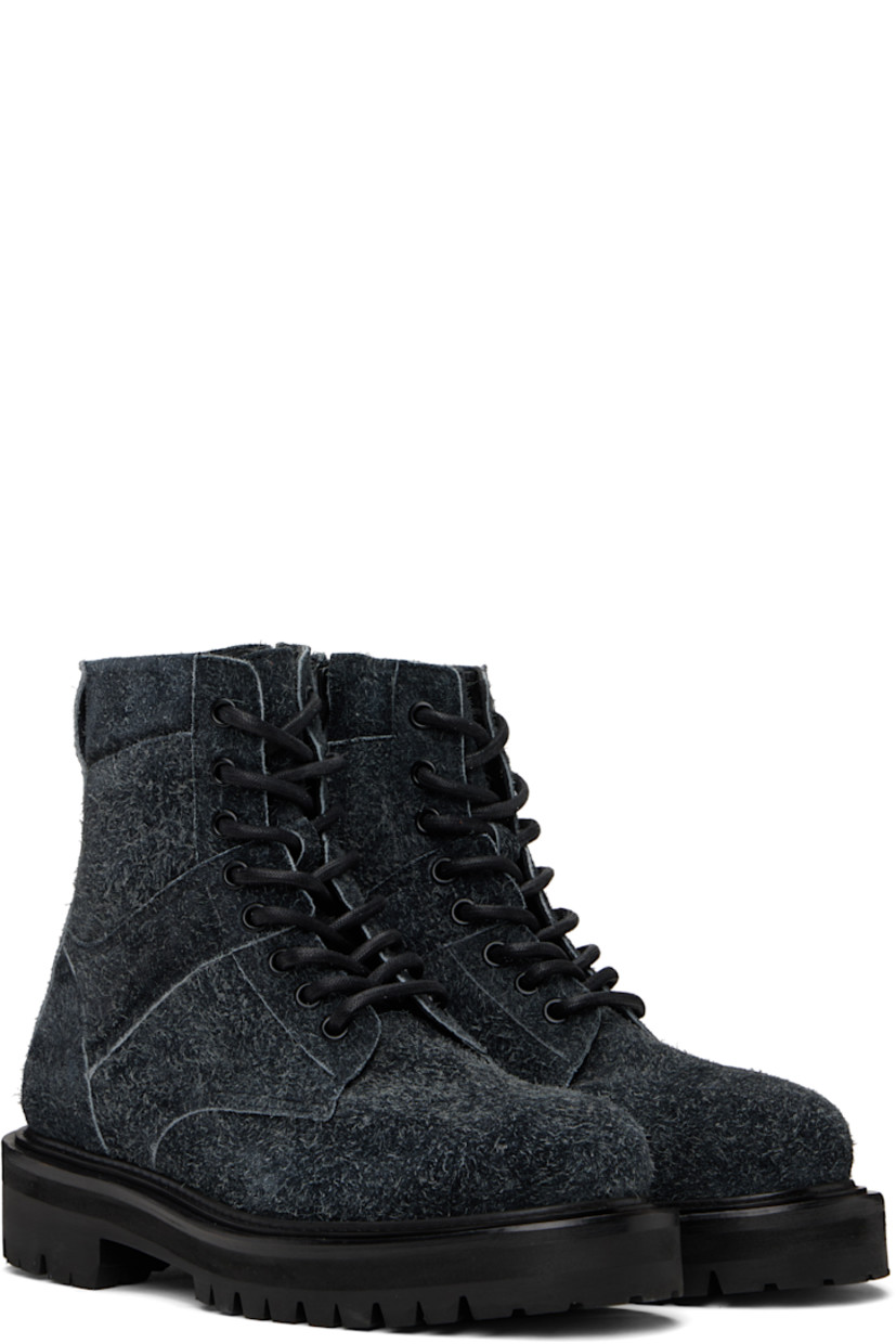 Ankle-high paneled nubuck boots in black.

· Lace-up closure
· Padded collar
· Pull-loop at heel collar
· Zip closure at inner side
· Treaded Vibram® rubber sole 

Supplier color: Ash