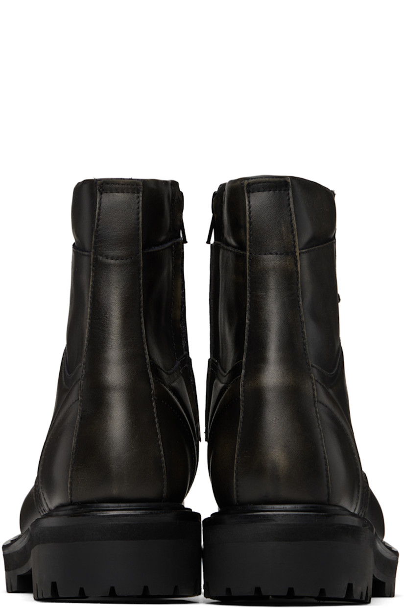Ankle-high paneled buffed leather boots in black.

· Lace-up closure
· Logo-embossed tongue
· Padded collar
· Pull-loop at heel collar
· Zip closure at inner side
· Treaded Vibram® rubber sole

Supplier color: Black