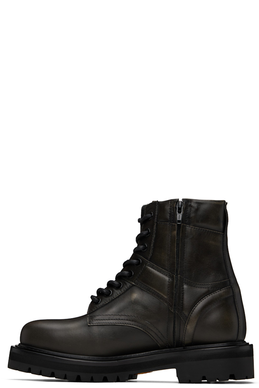 Ankle-high paneled buffed leather boots in black.

· Lace-up closure
· Logo-embossed tongue
· Padded collar
· Pull-loop at heel collar
· Zip closure at inner side
· Treaded Vibram® rubber sole

Supplier color: Black
