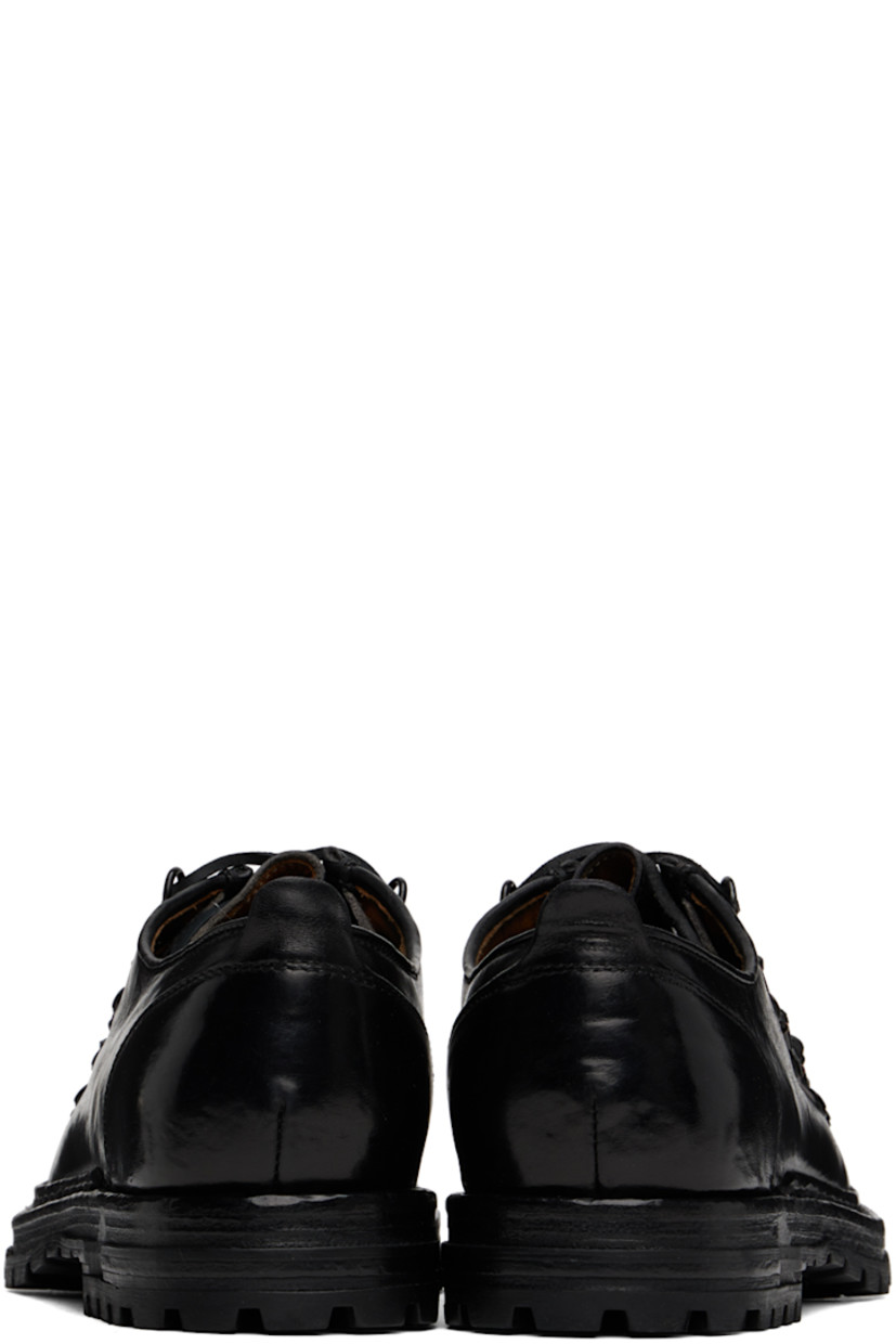 Handcrafted polished leather oxfords in black. 

· Moc toe
· Lace-up closure
· Pull-loop at heel tab
· Suede and grained leather lining
· Stacked leather midsole
· Treaded rubber sole 

Supplier color: Canyon nero