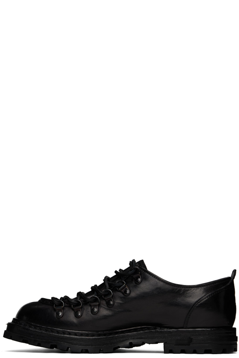 Handcrafted polished leather oxfords in black. 

· Moc toe
· Lace-up closure
· Pull-loop at heel tab
· Suede and grained leather lining
· Stacked leather midsole
· Treaded rubber sole 

Supplier color: Canyon nero