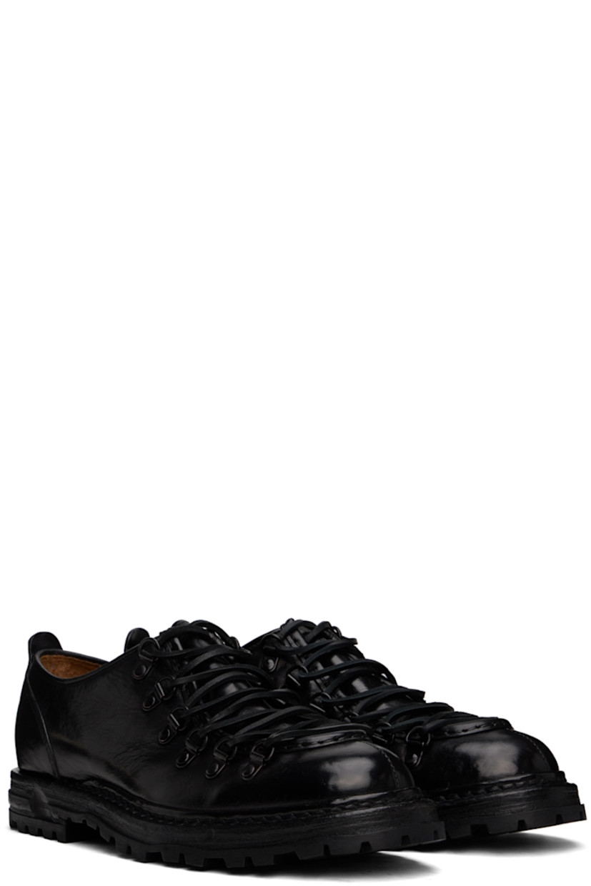 Handcrafted polished leather oxfords in black. 

· Moc toe
· Lace-up closure
· Pull-loop at heel tab
· Suede and grained leather lining
· Stacked leather midsole
· Treaded rubber sole 

Supplier color: Canyon nero