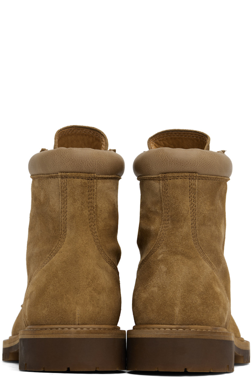 Handcrafted ankle-high suede boots in tan. 

· Lace-up closure
· Grained leather trim at padded collar
· Suede and grained leather lining
· Stacked leather midsole 
· Treaded rubber sole 

Supplier color: Alce/Rabbit paw