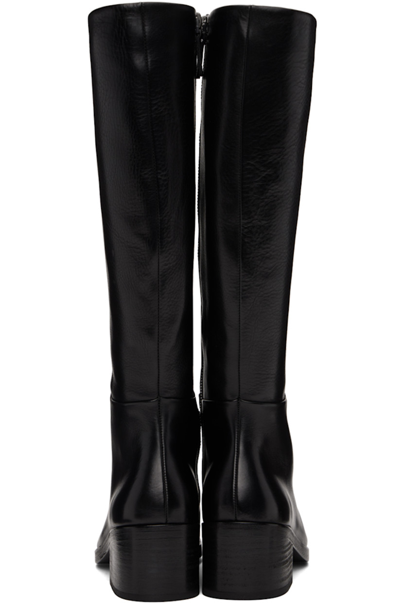 Knee-high grained leather boots in black.

· Square toe
· Zip closure at inner side
· Stacked leather heel with rubber injection
· Leather sole
· Heel: H2.25"

Supplier color: Black