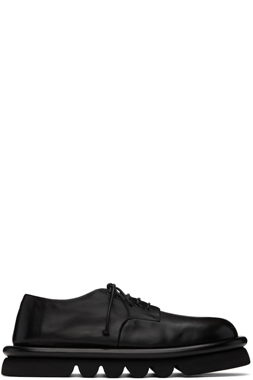 Buffed leather derbys in black.

· Lace-up closure
· Logo embossed at leather footbed
· Grained leather and suede lining
· Hand-milled lugged microfibre sole

Supplier color: Black