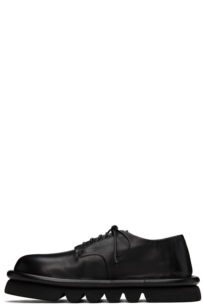 Buffed leather derbys in black.

· Lace-up closure
· Logo embossed at leather footbed
· Grained leather and suede lining
· Hand-milled lugged microfibre sole

Supplier color: Black
