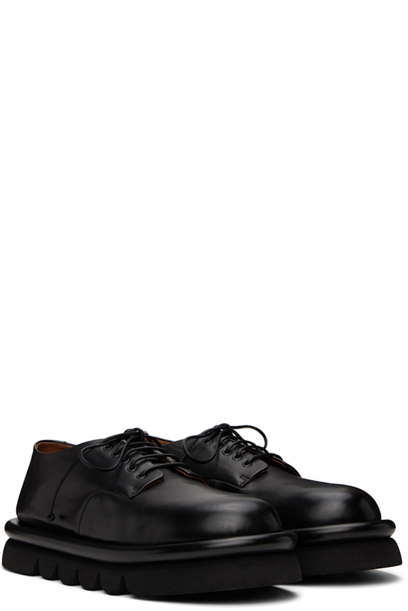 Buffed leather derbys in black.

· Lace-up closure
· Logo embossed at leather footbed
· Grained leather and suede lining
· Hand-milled lugged microfibre sole

Supplier color: Black