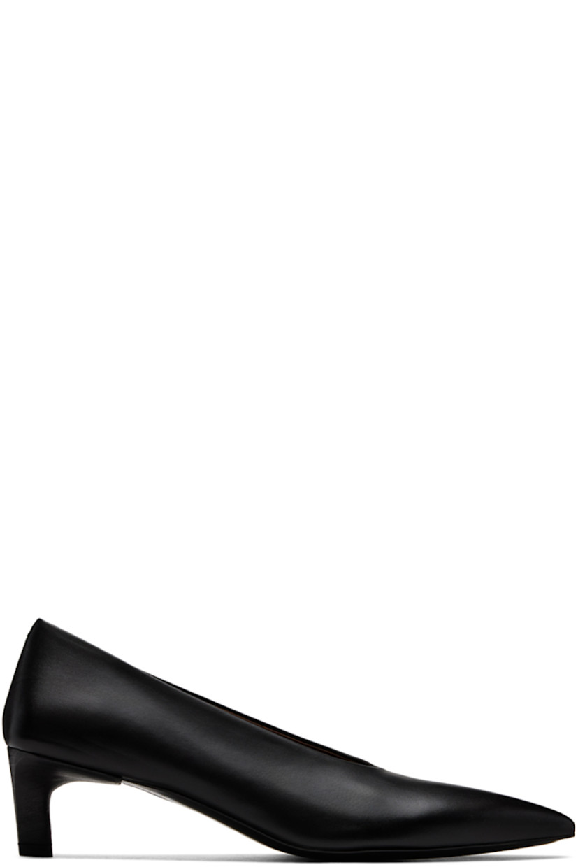 Buffed leather heels in black.

· Pointed toe
· Logo embossed at leather footbed
· Buffed leather and suede lining
· Hand-covered leather kitten heel
· Leather sole
· Heel: H2"

Supplier color: Black