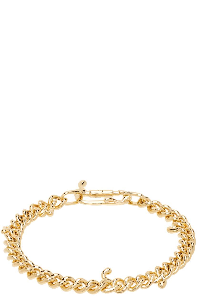 Curb chain bracelet in 18k gold-plated recycled sterling silver. 

· Graphic charms at length
· Lanyard-clasp fastening

Supplier color: Gold