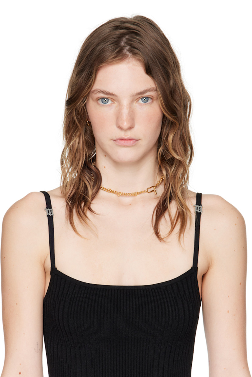 Single hoop earring in 18k gold-plated recycled sterling silver. 

· Graphic hardware at face
· Hinged-post fastening 
· H0.75" x W0.5"

Supplier color: Gold