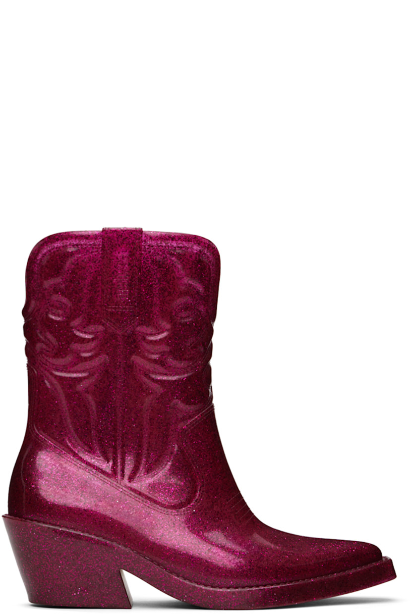 Ankle-high lightweight glittered PVC boots in pink.

· Quilted detailing throughout
· Pointed toe
· Logo embossed at sides
· Grenflex insole
· Rubber block heel
· Treaded rubber sole
· Heel: H2.25"

Supplier color: Glitter pink