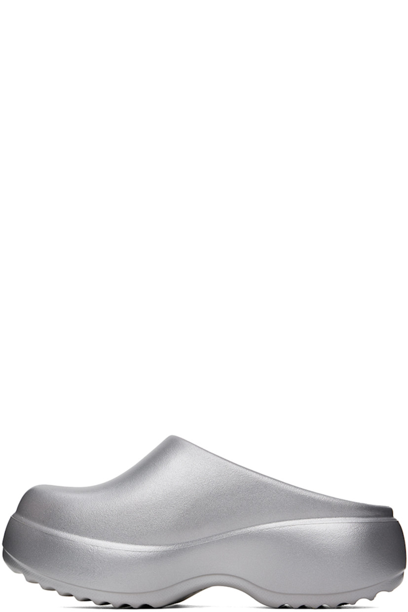 Slip-on lightweight EVA rubber loafers in silver-tone. 

· Rubberized logo patch at outer side
· Logo embossed at footbed
· Covered platform rubber midsole
· Treaded rubber sole
· Platform: H2.5"

Supplier color: Gray