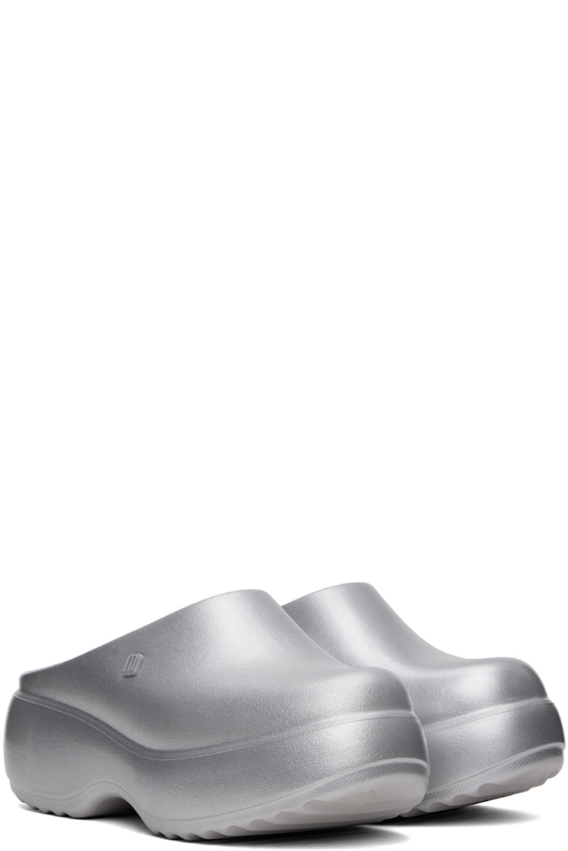 Slip-on lightweight EVA rubber loafers in silver-tone. 

· Rubberized logo patch at outer side
· Logo embossed at footbed
· Covered platform rubber midsole
· Treaded rubber sole
· Platform: H2.5"

Supplier color: Gray