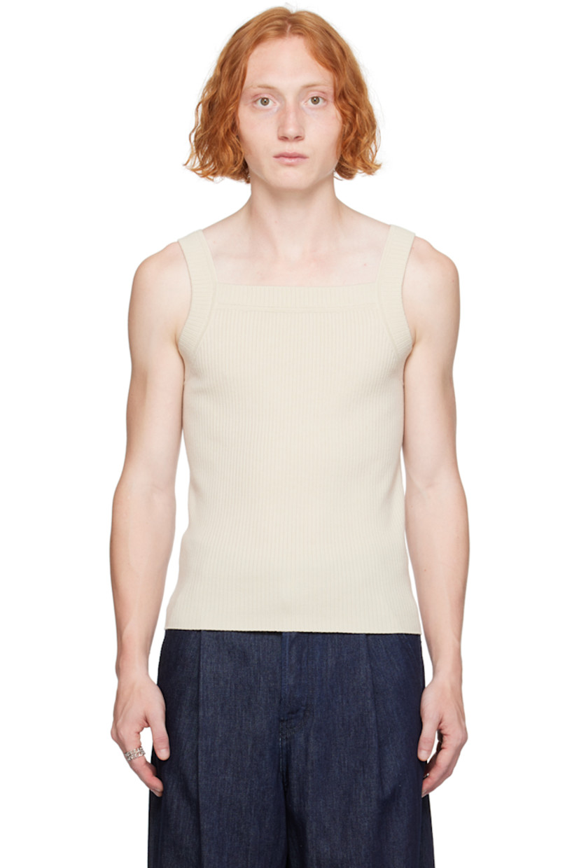 Rib knit stretch merino wool tank top. 

· Square neck 
· Fixed shoulder straps 

Supplier color: Ecru