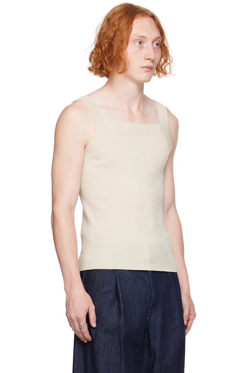 Rib knit stretch merino wool tank top. 

· Square neck 
· Fixed shoulder straps 

Supplier color: Ecru