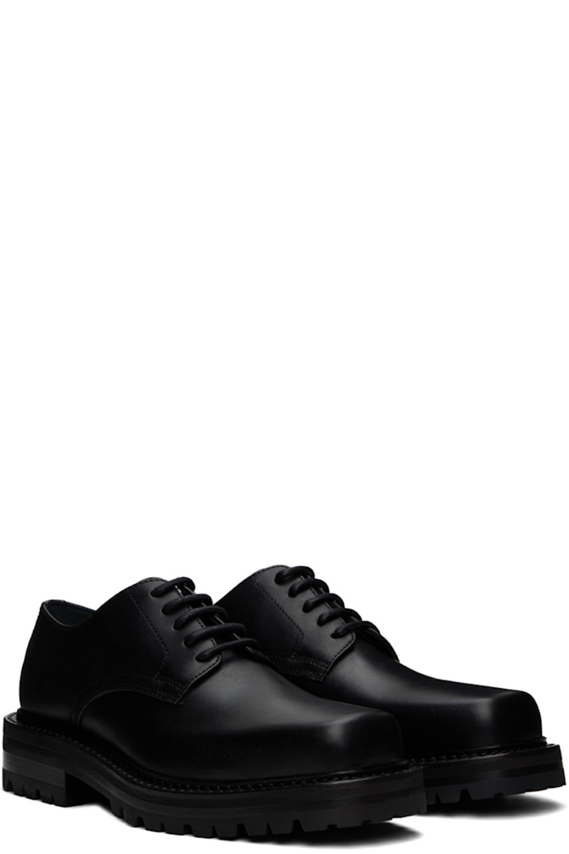 Buffed leather derbys in black. 

· Square toe
· Lace-up closure
· Buffed leather and suede lining
· Stacked leather heel with rubber injection
· Treaded rubber sole
· Heel: H1.5"

Supplier color: Black