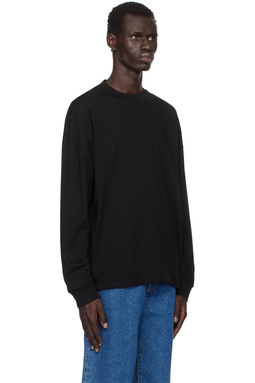 Cotton jersey T-shirt.

· Rib-knit mock neck and cuffs
· Dropped shoulders
· Central seam at back

Supplier color: Black