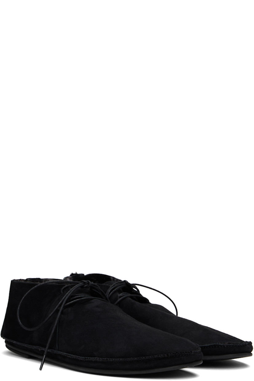 Suede derbys in black.

· Moc toe
· Lace-up closure
· Shearling lining
· Pinched seam at welt
· Treaded rubber sole

Supplier color: Black