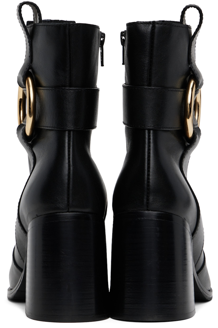 Ankle-high buffed leather boots in black.

· Zip closure at inner side
· Embossed logo and O-ring at outer side
· Pull-loop at collar
· Serrated edge at welt
· Stacked leather block heel
· Treaded rubber sole 
· Heel: H3.5"

Supplier color: Black