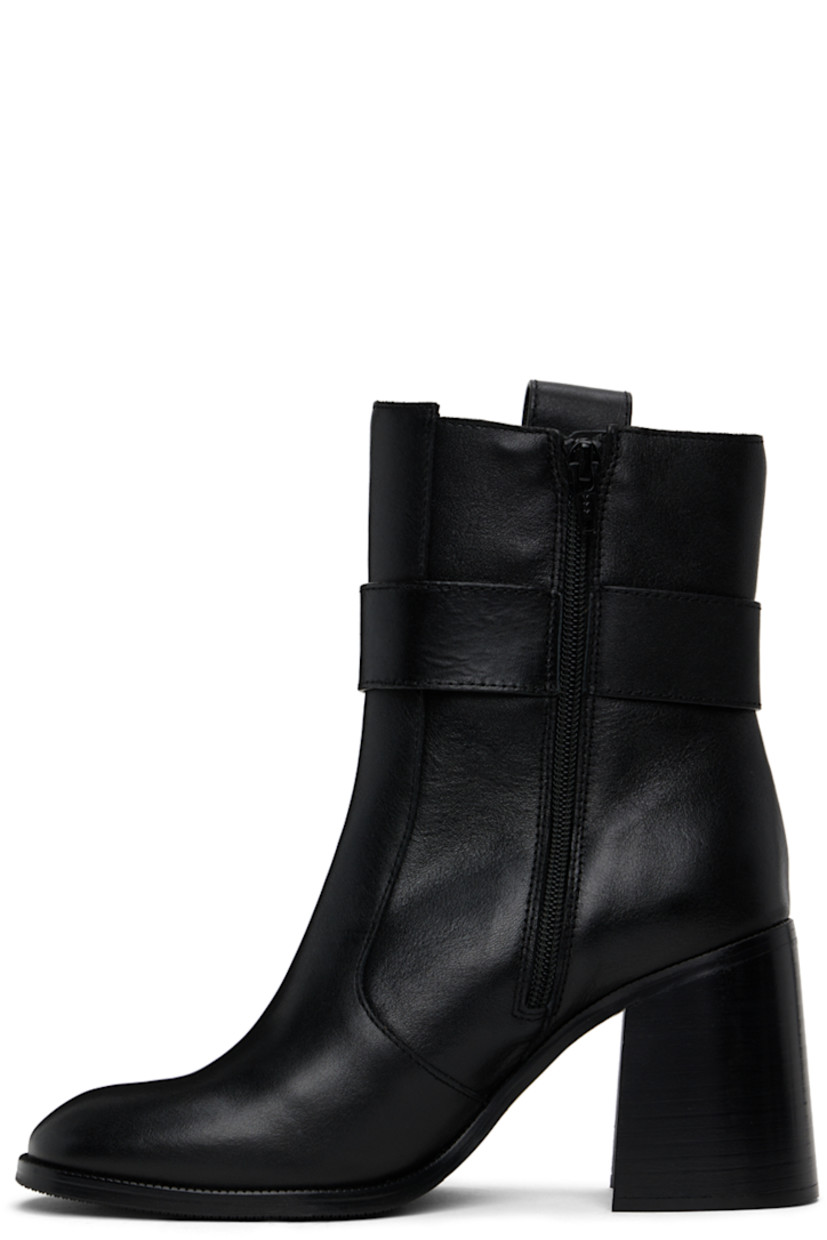 Ankle-high buffed leather boots in black.

· Zip closure at inner side
· Embossed logo and O-ring at outer side
· Pull-loop at collar
· Serrated edge at welt
· Stacked leather block heel
· Treaded rubber sole 
· Heel: H3.5"

Supplier color: Black