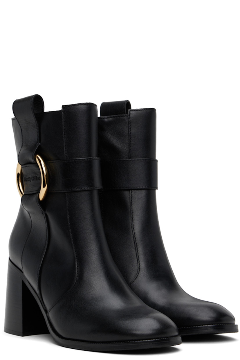 Ankle-high buffed leather boots in black.

· Zip closure at inner side
· Embossed logo and O-ring at outer side
· Pull-loop at collar
· Serrated edge at welt
· Stacked leather block heel
· Treaded rubber sole 
· Heel: H3.5"

Supplier color: Black