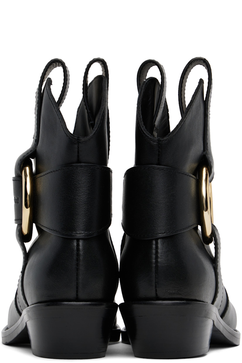Ankle-high buffed leather boots in black. 

· Pointed toe
· Pull-loops at collar 
· Embossed logo and O-ring at outer side
· Stacked leather heel
· Rubber sole
· Gold-tone hardware
· Heel: H1.5"

Supplier color: Black