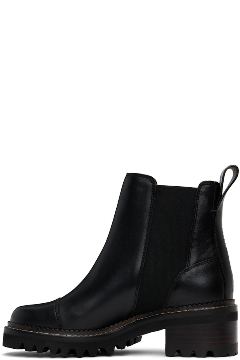 Ankle-high grained leather boots in black. 

· Cap toe
· Elasticized gusset at sides
· Pull-loop at heel tab
· Logo embossed at heel counter
· Stacked leather block heel
· Scalloped detailing and topstitching at welt
· Treaded rubber sole 
· Heel: H2"

Supplier color: Black